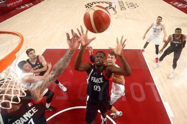 France's Moustapha Fall jumps for the ball in the men's preliminary round group A basketball match between France and Czech Republic during the Tokyo...