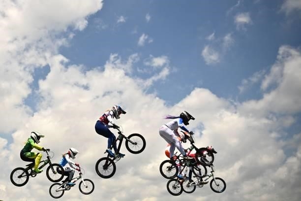 Cyclists compete in the cycling BMX racing women's quarter-finals run at the Ariake Urban Sports Park during the Tokyo 2020 Olympic Games in Tokyo on...