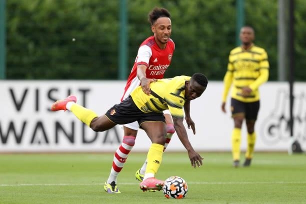 Pierre-Emerick Aubameyang of Arsenal and Peter Etebo of Watford during the Pre-Season Friendly between Arsenal and Watford at London Colney on July...