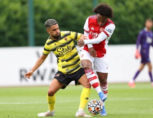 Imran Louza of Watford and Willian of Arsenal during the Pre-Season Friendly between Arsenal and Watford at London Colney on July 28, 2021 in St...