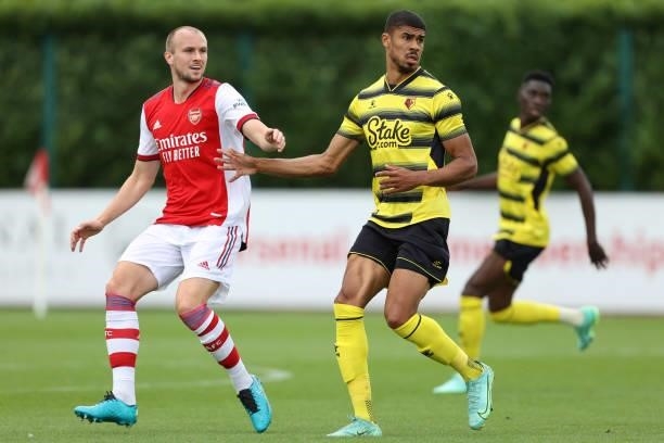 Rob Holding of Arsenal and Ashley Fletcher of Watford during the Pre-Season Friendly between Arsenal and Watford at London Colney on July 28, 2021 in...
