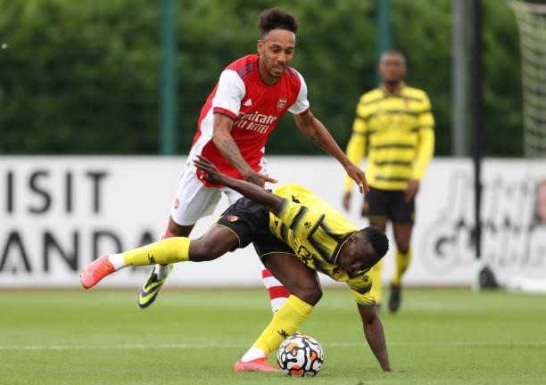Pierre-Emerick Aubameyang of Arsenal and Peter Etebo of Watford during the Pre-Season Friendly between Arsenal and Watford at London Colney on July...