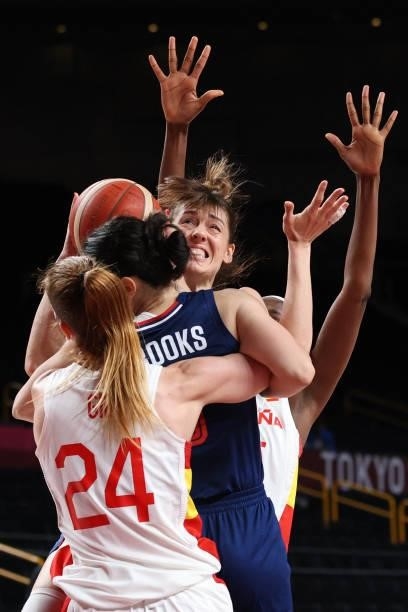 Serbia's Jelena Brooks fights for the ball with Spanish players in the women's preliminary round group A basketball match between Spain and Serbia...
