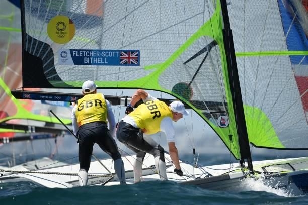 Britains Stuart Bithell and Dlan Fletcher-Scott take part in the men's skiff 49er race during the Tokyo 2020 Olympic Games sailing competition at the...
