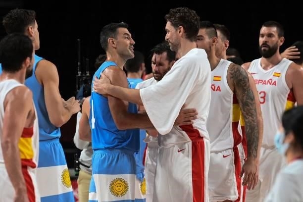 Argentina's Luis Scola and Spain's Pau Gasol Saez talk at the end of the men's preliminary round group C basketball match between Spain and Argentina...