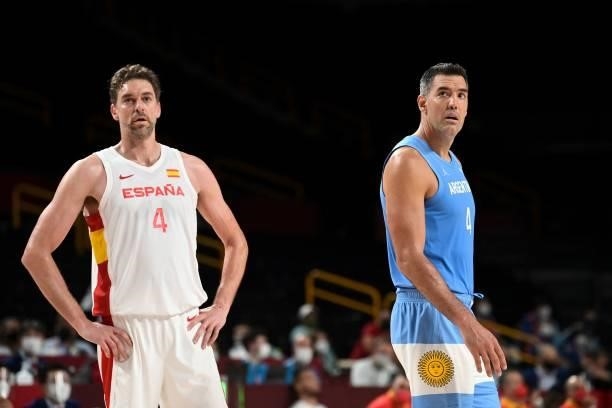 Spain's Pau Gasol Saez and Argentina's Luis Scola look on during the men's preliminary round group C basketball match between Spain and Argentina...