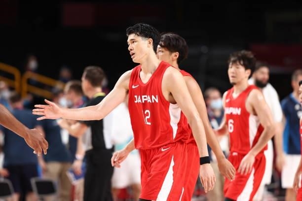 Yuta Watanabe of the Japan Men's National Team high fives teammate during the game against the Slovenia Men's National Team during the 2020 Tokyo...