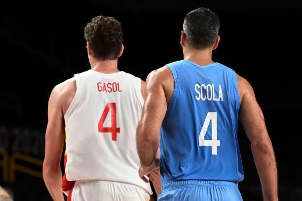 Spain's Pau Gasol Saez and Argentina's Luis Scola compete during the men's preliminary round group C basketball match between Spain and Argentina...