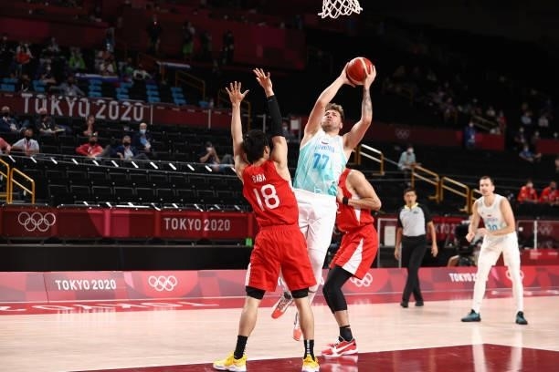 Luka Doncic of the Slovenia Men's National Team drives to the basket against the Japan Men's National Team during the 2020 Tokyo Olympics at the...