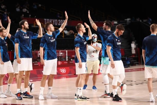 The Slovenia Men's National Team high five before the game against the Japan Men's National Team during the 2020 Tokyo Olympics at the Saitama Super...