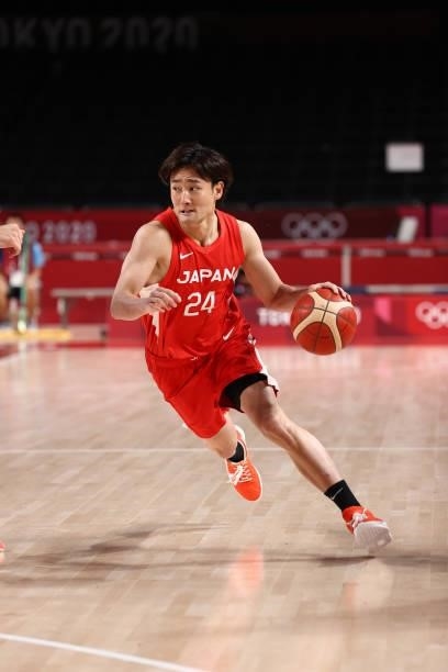 Daiki Tanaka of the Japan Men's National Team dribbles the ball against the Slovenia Men's National Team during the 2020 Tokyo Olympics at the...