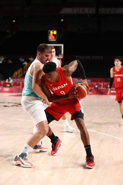Luka Doncic of the Slovenia Men's National Team plays defense on Rui Hachimura of the Japan Men's National Team during the 2020 Tokyo Olympics at the...