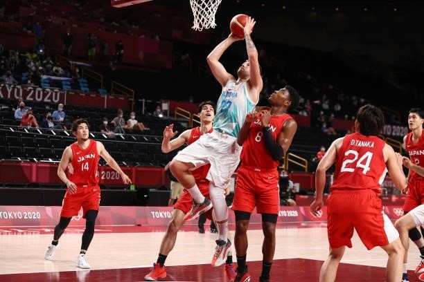 Luka Doncic of the Slovenia Men's National Team drives to the basket against the Japan Men's National Team during the 2020 Tokyo Olympics at the...