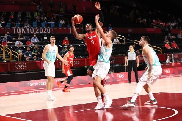 Rui Hachimura of the Japan Men's National Team drives to the basket against the Slovenia Men's National Team during the 2020 Tokyo Olympics at the...