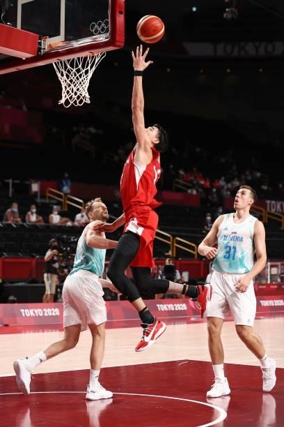 Yuta Watanabe of the Japan Men's National Team shoots the ball against the Slovenia Men's National Team during the 2020 Tokyo Olympics at the Saitama...