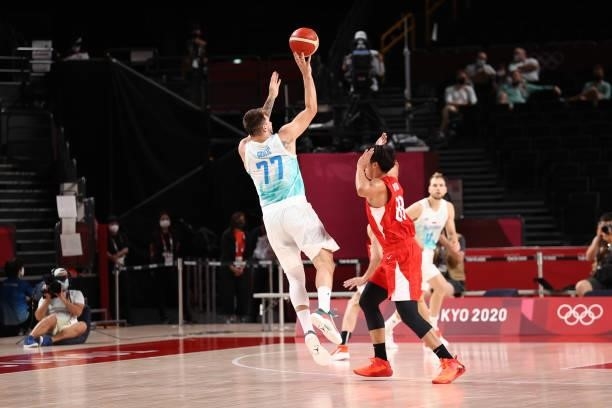 Luka Doncic of the Slovenia Men's National Team shoots the ball against the Japan Men's National Team during the 2020 Tokyo Olympics at the Saitama...