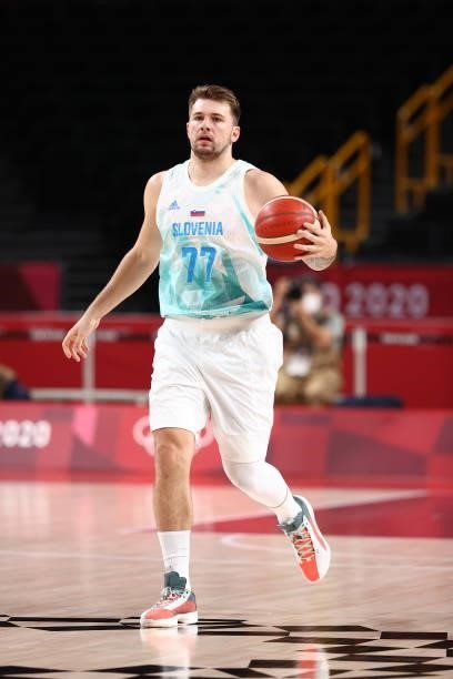 Luka Doncic of the Slovenia Men's National Team dribbles the ball against the Japan Men's National Team during the 2020 Tokyo Olympics at the Saitama...