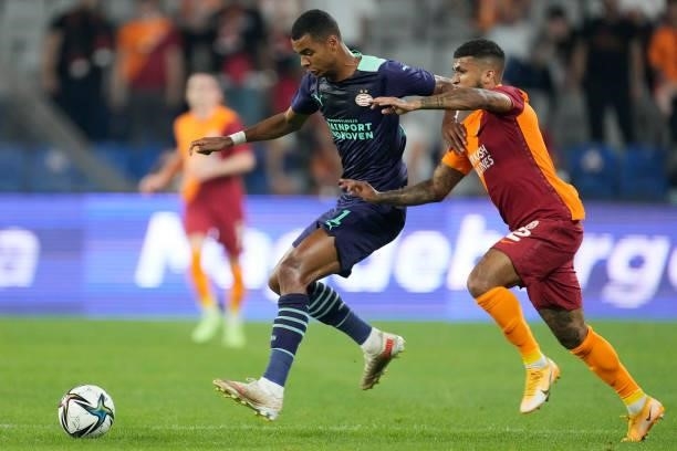 Cody Gakpo of PSV, DeAndre Yedlin of Galatasaray during the UEFA Champions League match between Galatasaray v PSV at the Turk Telekom Stadium on July...