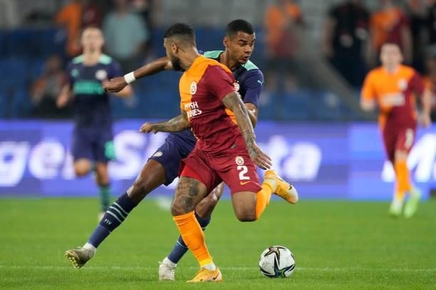 Cody Gakpo of PSV, DeAndre Yedlin of Galatasaray during the UEFA Champions League match between Galatasaray v PSV at the Turk Telekom Stadium on July...