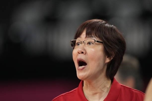 China's head coach Lang Ping reacts during the Women's Preliminary - Pool B volleyball match between China and ROC on day six of the Tokyo 2020...