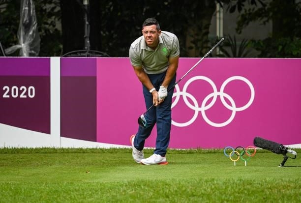 Rory McIlroy of Team Ireland reacts to his shot from the 17th tee during the first round of Mens Individual Stroke Play Golf on day six of the Tokyo...
