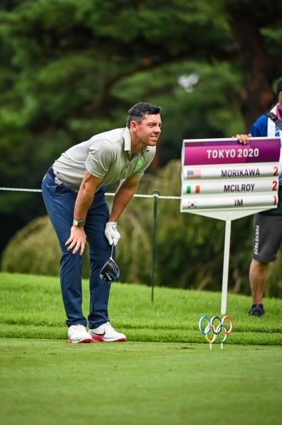Rory McIlroy of Team Ireland reacts to his shot from the 18th tee during the first round of Mens Individual Stroke Play Golf on day six of the Tokyo...