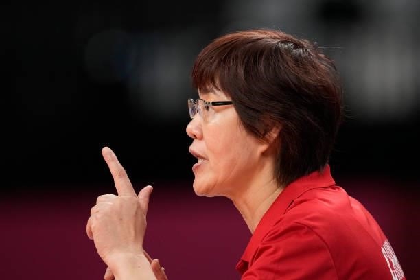 China's head coach Lang Ping reacts during the Women's Preliminary - Pool B volleyball match between China and ROC on day six of the Tokyo 2020...