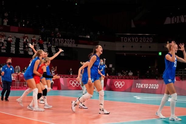 Players of Team ROC celebrate victory against Team China during the Women's Preliminary - Pool B volleyball on day six of the Tokyo 2020 Olympic...