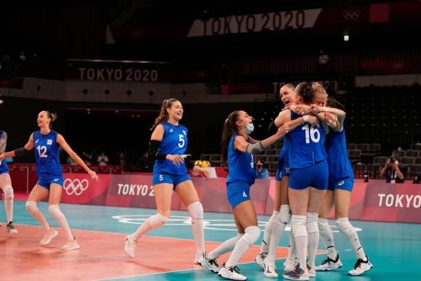Players of Team ROC celebrate victory against Team China during the Women's Preliminary - Pool B volleyball on day six of the Tokyo 2020 Olympic...