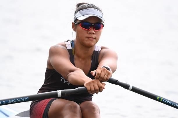 Singapore's Poh Joan competes in the women's single sculls final E during the Tokyo 2020 Olympic Games at the Sea Forest Waterway in Tokyo on July...