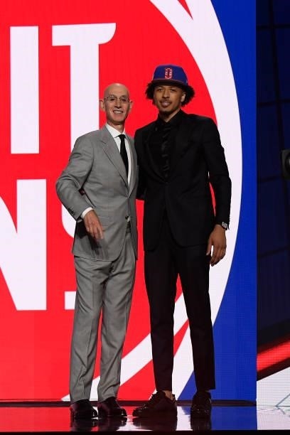 Cade Cunningham shakes hands with NBA Commissioner Adam Silver after being selected number one overall by the Detroit Pistons during the 2021 NBA...