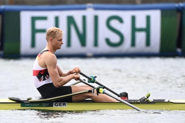 Germany's Oliver Zeidler reacts after finished in the men's single sculls final B during the Tokyo 2020 Olympic Games at the Sea Forest Waterway in...