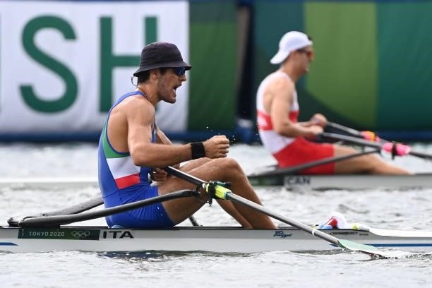 Italy's Gennaro Di Mauro reacts after finished in the men's single sculls final B during the Tokyo 2020 Olympic Games at the Sea Forest Waterway in...