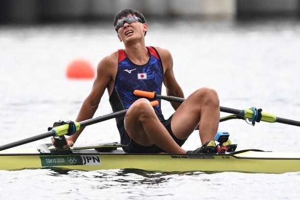 Japan's Ryuta Arakawa reacts after the men's single sculls final B during the Tokyo 2020 Olympic Games at the Sea Forest Waterway in Tokyo on July...