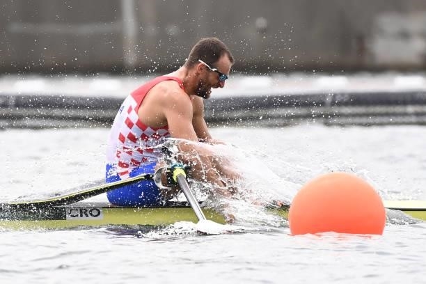 Croatia's Damir Martin reacts after winning the bronze medal in the men's single sculls final during the Tokyo 2020 Olympic Games at the Sea Forest...