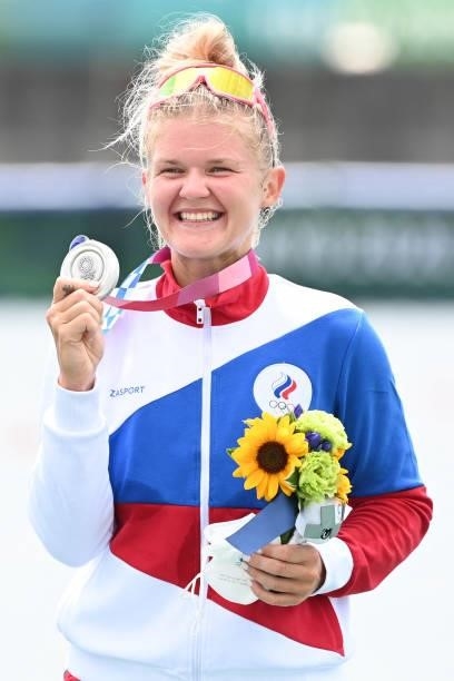Silver medalist Russia's Hanna Prakhatsen poses on the podium following the women's single sculls final during the Tokyo 2020 Olympic Games at the...