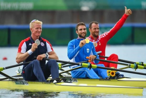 Tokyo , Japan - 30 July 2021; Men's Single Sculls final medalists, from left, second place Kjetil Borch of Norway, first place Stefanos Ntouskos of...