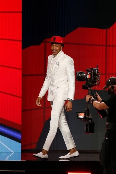 Scottie Barnes leaves the podium after being selected number four overall by the Toronto Raptors during the 2021 NBA Draft on July 29, 2021 at...