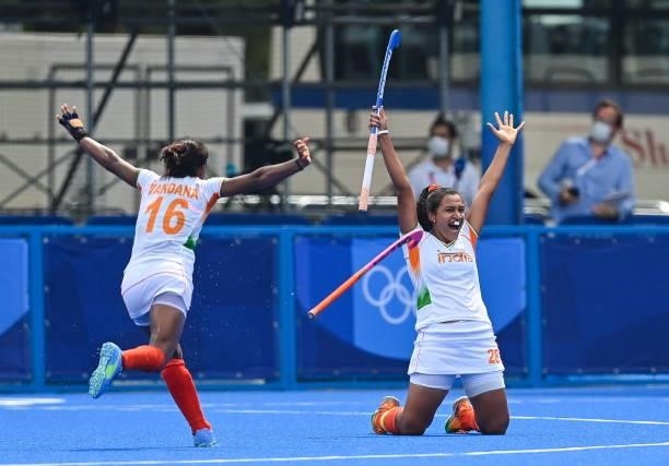 Tokyo , Japan - 30 July 2021; Rani of India, right, celebrates with team-mate Vandana Katariya, left, after assisting their side's first goal during...