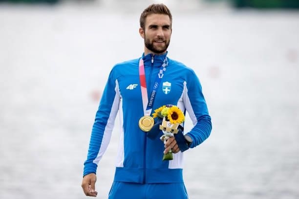 Gold medalist Stefanos Ntouskos of Team Greece pose with his medal during the medal ceremony for the Men's Single Sculls Final A on day seven of the...
