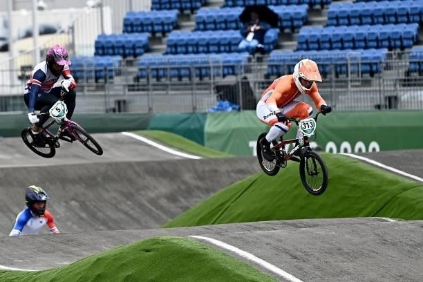 Britain's Kye Whyte and Netherlands' Niek Kimmann compete in the cycling BMX racing men's final at the Ariake Urban Sports Park during the Tokyo 2020...