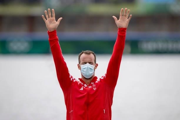 Damir Martin of Team Croatia celebrates winning the bronze medal during the medal ceremony for the Men's Single Sculls Final A on day seven of the...