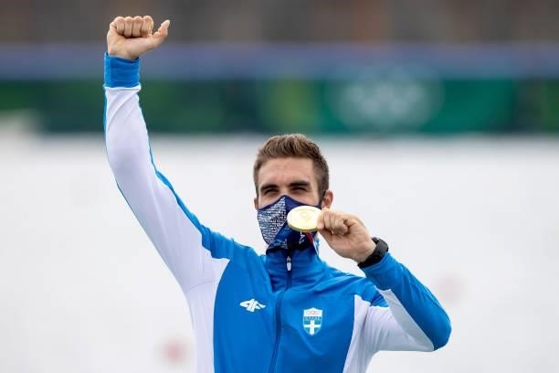 Gold medalist Stefanos Ntouskos of Team Greece pose with his medal during the medal ceremony for the Men's Single Sculls Final A on day seven of the...
