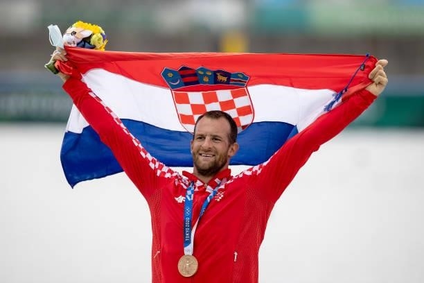 Bronze medalist Damir Martin of Team Croatia poses with his medal during the medal ceremony for the Men's Single Sculls Final A on day seven of the...