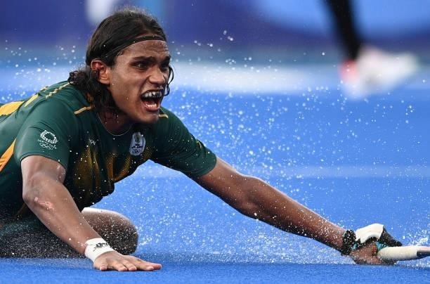 South Africa's Mustaphaa Cassiem reacts during the men's pool B match of the Tokyo 2020 Olympic Games field hockey competition against Canada, at the...