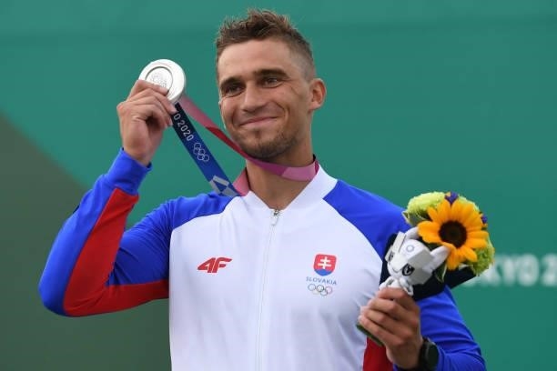 Silver medalist Slovakia's Jakub Grigar poses on the podium following the men's Kayak final during the Tokyo 2020 Olympic Games at Kasai Canoe Slalom...
