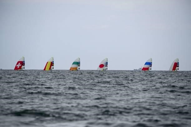 Competitors take part in the men's skiff 49er race during the Tokyo 2020 Olympic Games sailing competition at the Enoshima Yacht Harbour in Fujisawa,...