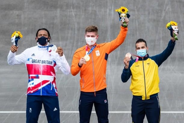 Kye Whyte of Great Britain, Niek Kimmann of Netherlands and Carlos Alberto Ramirez Yepes of Columbia cheering after the award ceremony during the...