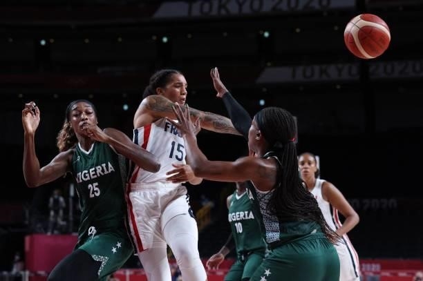 France's Gabrielle Williams passes the ball past Nigeria's Victoria Macaulay in the women's preliminary round group B basketball match between France...