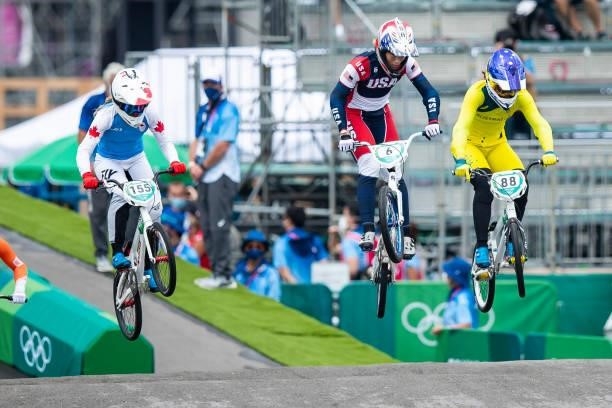 Drew Mechielsen of Canada, Felicia Stancil of USA and Saya Sakakibara of Australia compete during the Women's BMX Racing Run on day seven of the...